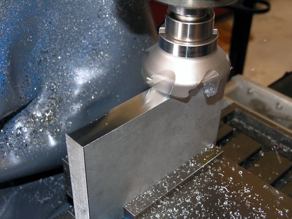 Milling machine with rotating cutting tools.