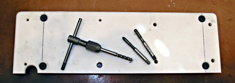 Collection of machining tools on a plastic tool tray.