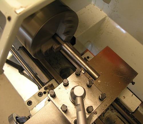 Metal lathe spindle head and tool post.