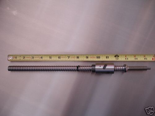 Silver metal threaded rod with spiral design and central nut.