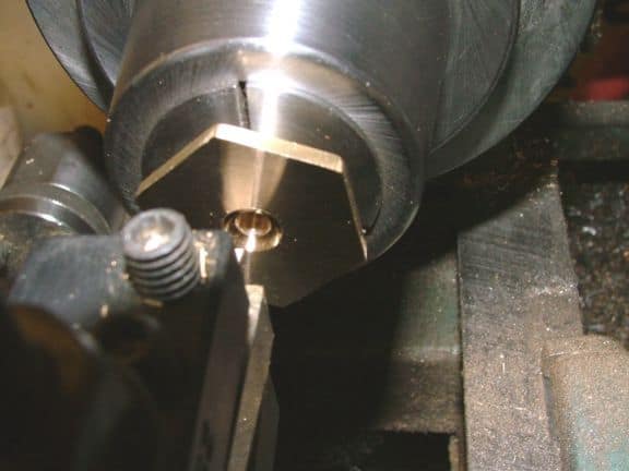 Metalworking lathe tool with intricate details.