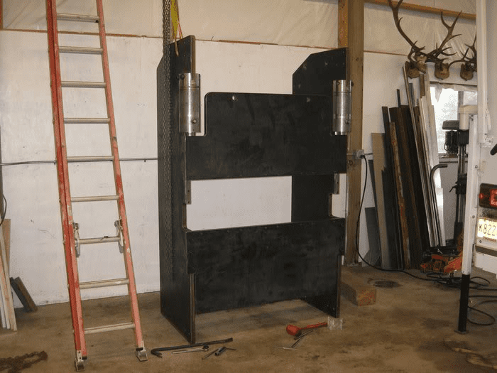 Garage workshop with various tools and equipment.