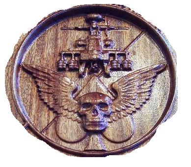 Blue background with an eagle logo featuring outstretched wings and a sword, along with text reading CNCCookbook.com.