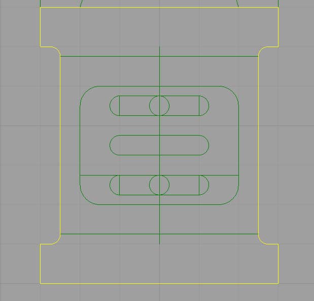 Rounded object with green outlines, ovals, and rectangle on gray background.