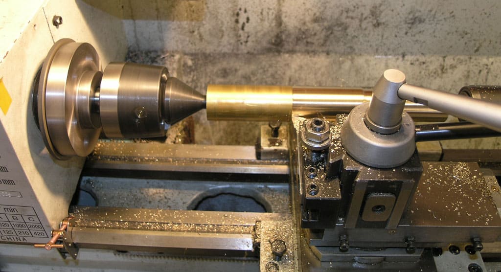 Lathe tool bit mounted to spindle chuck on a lathe machine.