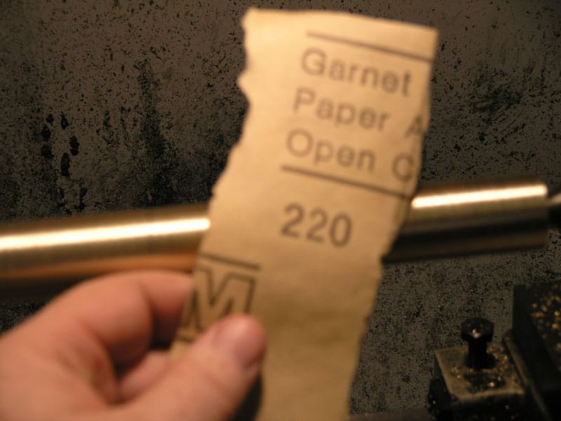Garnet paper with #220 grit marking.
