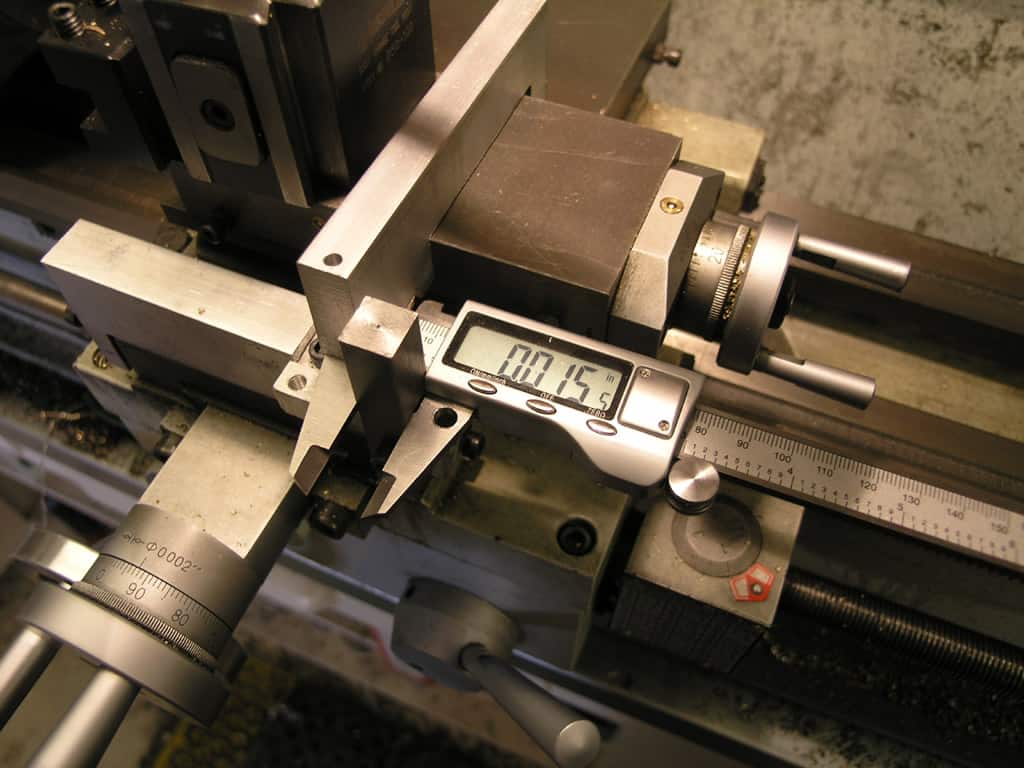 Digital caliper with precision LCD screen and built-in laser pointer.