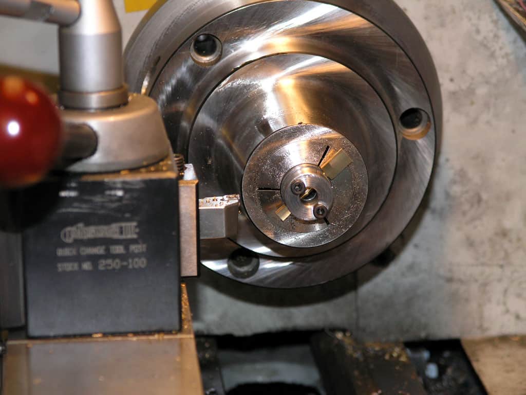 Lathe's spindle and tailstock machinery.