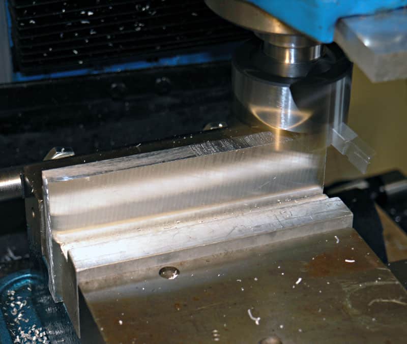 Metalworking machine in operation, showcasing precision cutting capabilities and optimal workshop setting.