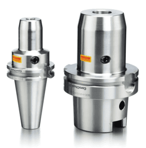 Silver metal object with a cylindrical shape and tapered end, featuring two small holes on its top.