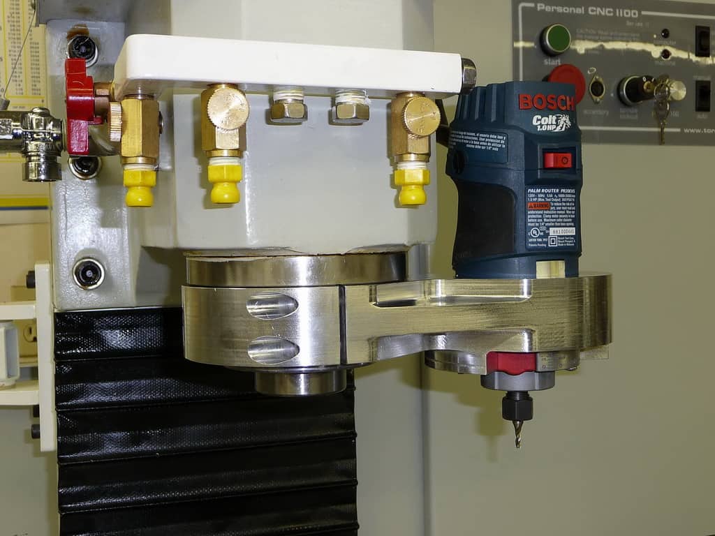 Bosch Colt router mounted on milling machine.