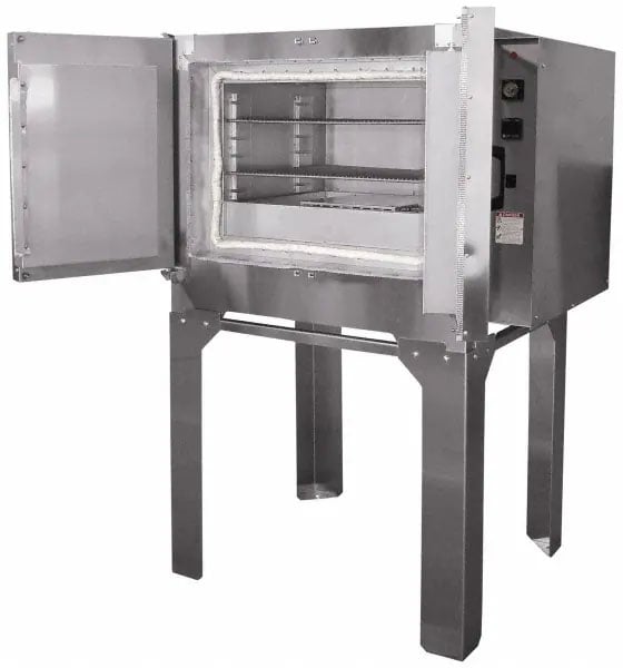 Stainless steel heat treatment oven with open door, set against a white background.