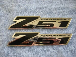 Z51 Performance logo in black and gold on gray background.