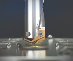 Metal tool or component with rounded end.