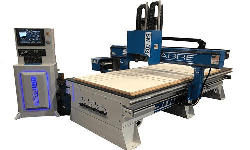A blue and gray ABRE CNC router with flat table top.