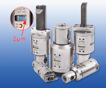 Digital micrometer with display and buttons on a blue background.