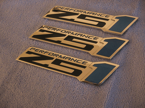 Gold and black "Performance Z51" rectangular stickers.