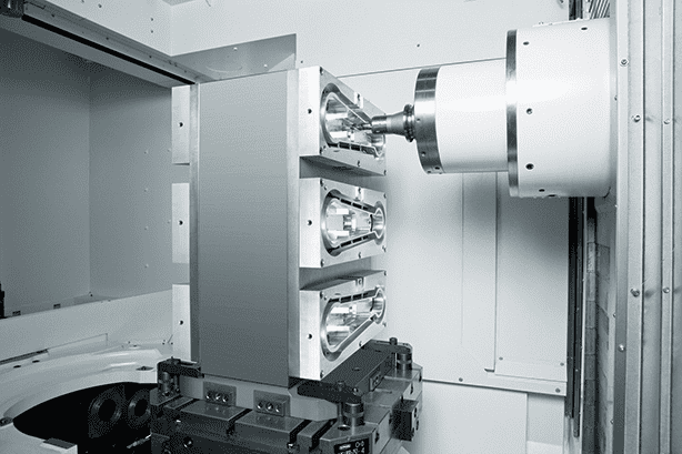 Industrial machine with attached components and metal parts equipment.