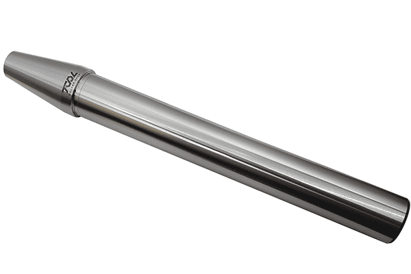 A silver metal tube with tapered ends and the word TOOL engraved on it, possibly used in a machining environment.