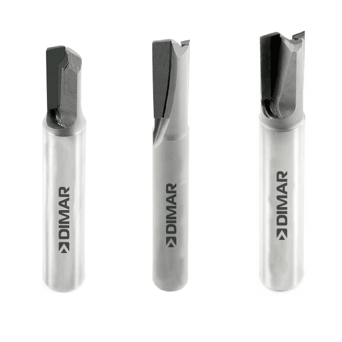 Three cylindrical cutting tools with flat tops and pointed tips, arranged in a row with slight offset on leftmost object.