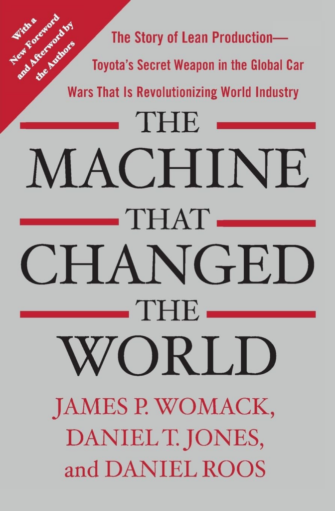 Gray background book cover with red and black text featuring 'The Machine That Changed the World' title and author names.