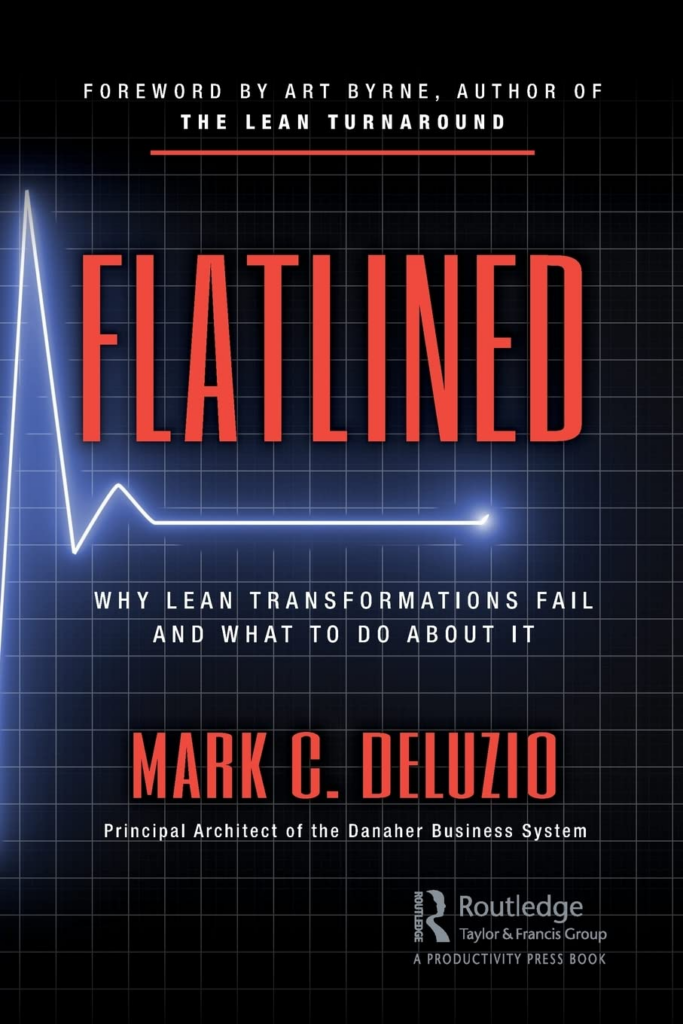 Blue grid background with white lines, red and white text, "Flatlined" book cover by Mark C. Deluzio.